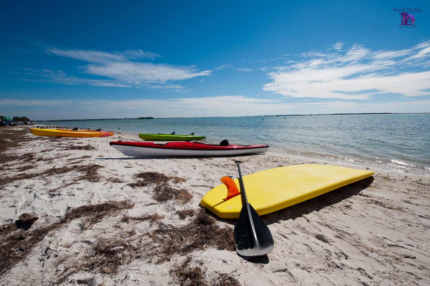 Picture of Honeymoon Island State Park in Palm Harbor Florida with the beach, water, and three kayaks